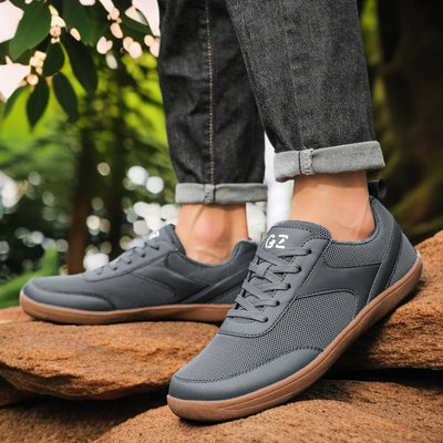 Scarpe sportive ortopediche a rete: dotate di supporto per l'arco plantare, alleviano il dolore; morbide e ammortizzanti.