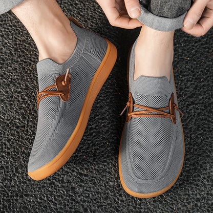 Scarpe sportive ortopediche a rete: dotate di supporto per l'arco plantare, alleviano il dolore; morbide e ammortizzanti.