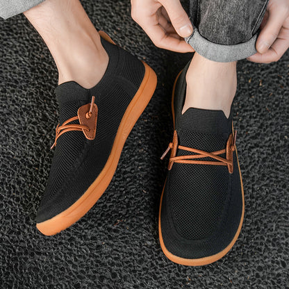 Scarpe sportive ortopediche a rete: dotate di supporto per l'arco plantare, alleviano il dolore; morbide e ammortizzanti.