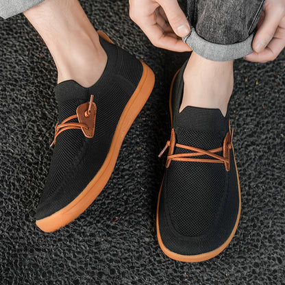 Scarpe sportive ortopediche a rete: dotate di supporto per l'arco plantare, alleviano il dolore; morbide e ammortizzanti.